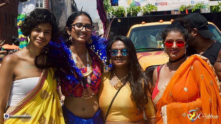 4 Indian women prideful masqueraders photo credit Marcus W Persaud 711x400
