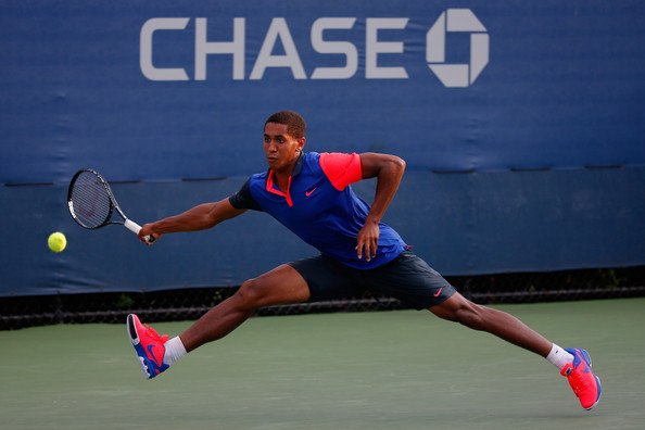 Michael-Mmoh 2014-US-OPEN Junior-Boys-Singles-First-Round-against-Yunseong-Chung Chris-Trotman Getty-Images