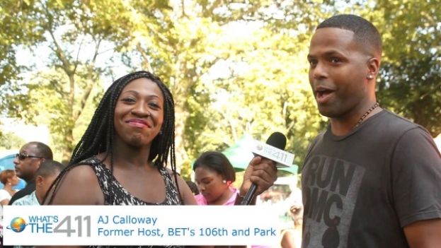 AJ Calloway, former host of BET's 106th and Park, talking with What's The 411 reporter, Cristina Twitty at the Celebration of 40 Years of Hip-Hop in Central Park in New York City