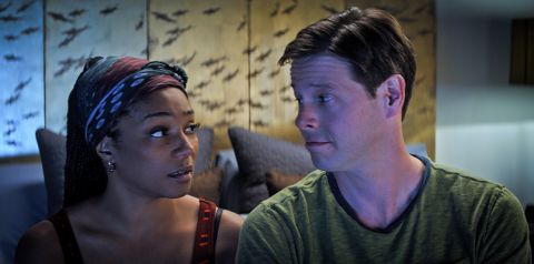 Tiffany Haddish (left) and Ike Barinholtz in the movie, 