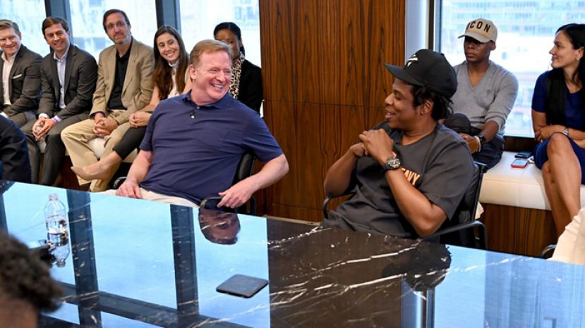 NFL commissioner, Roger Goodell (left), with hip-hop business mogul, Jay Z, announcing Jay Z&#039;s company&#039;s partnership with the NFL. 