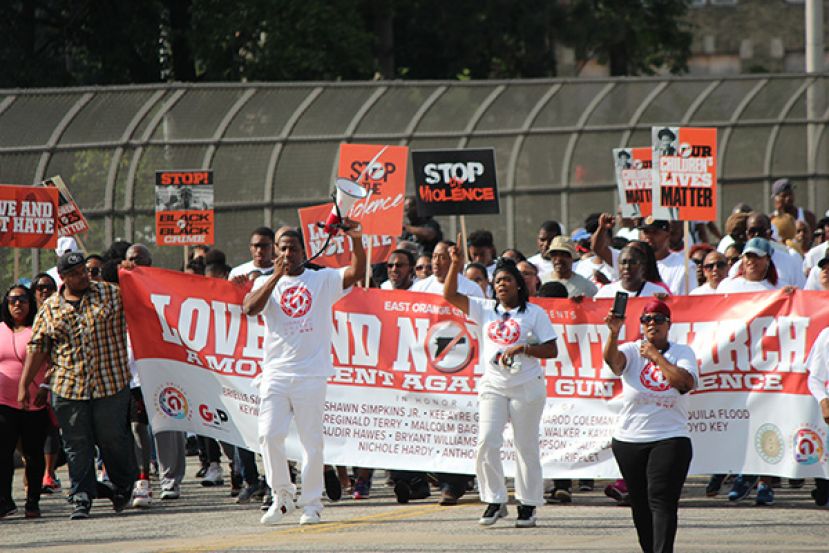 Dy-Shawn Simpkins (middle) with bull-horn leading the Love and Not Hate March in East Orange, NJ. 