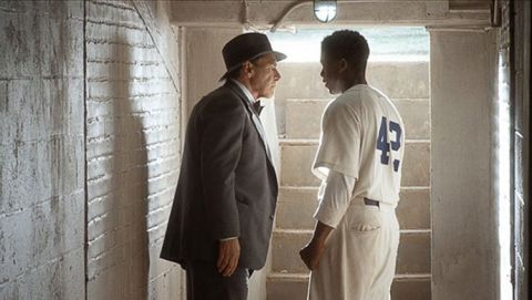 Harrison Ford (l) and Chadwick Boseman in the movie 42