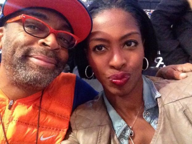 Legendary Filmmaker Spike Lee and What&#039;s The 411TV and What&#039;s The 411Sports reporter Crystal Lynn at Barclays Center for Brooklyn Nets v New York Knicks game.