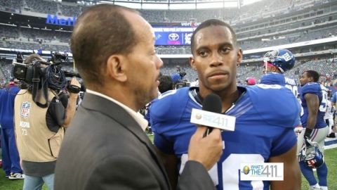 What's The 411Sports reporter Andrew Rosario talking with New York Giants wide receiver Victor Cruz after a game.