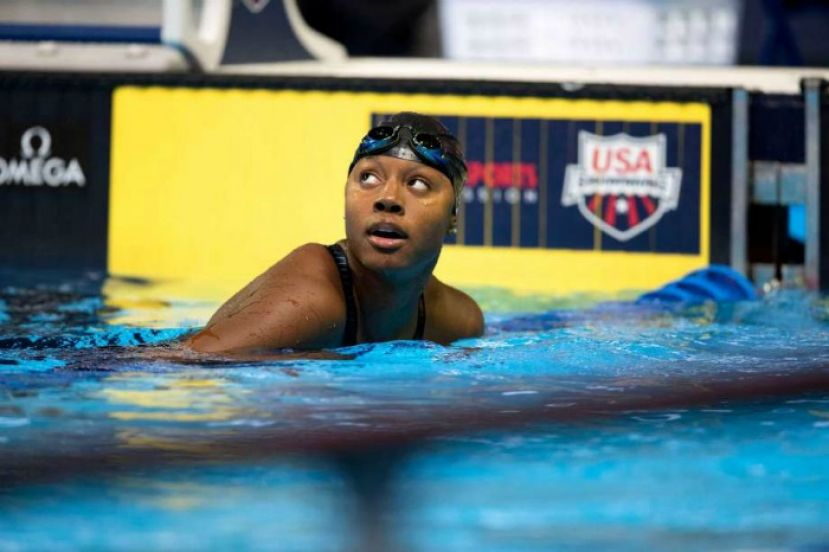 Simone Manuel of Sugar Land, Texas, wins first place and gold medal for the 100m individual swimming contest at the 2016 Summer Olympic games in Rio de Janeiro